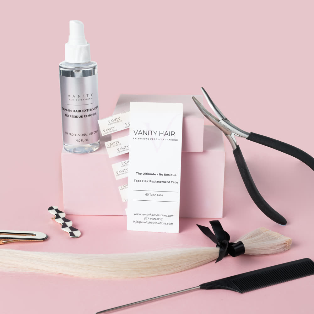 The complete Vanity system — remover, tab card, application pliers, weft and comb on a blush set