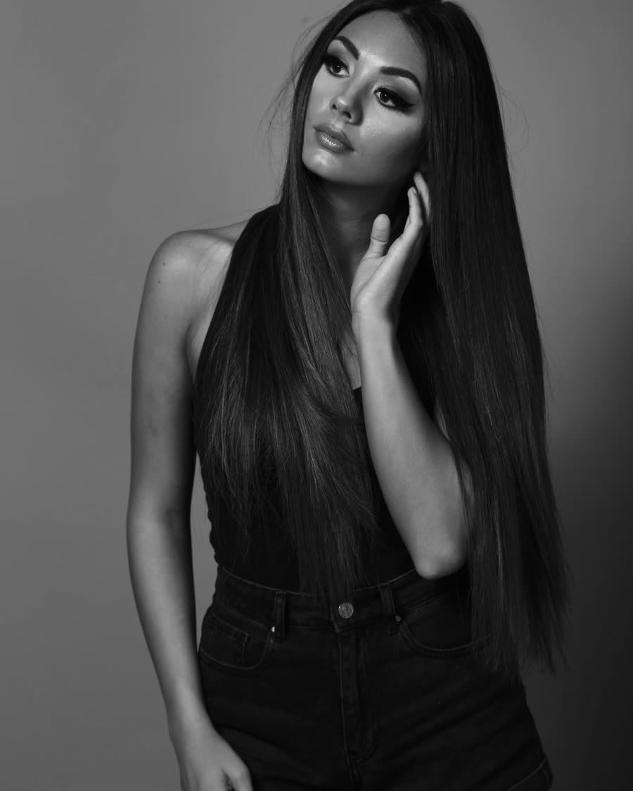 Long straight tape-in extensions, studio portrait