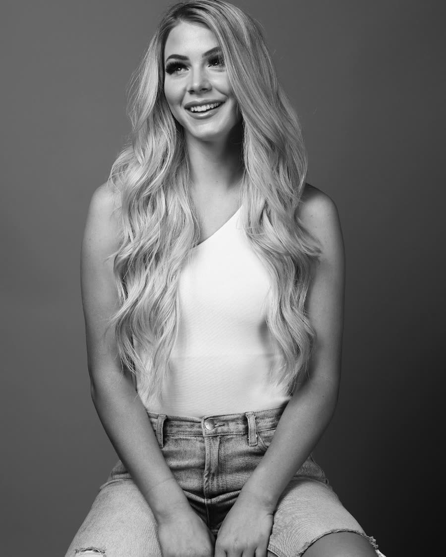 Tape-in extensions styled long, studio portrait